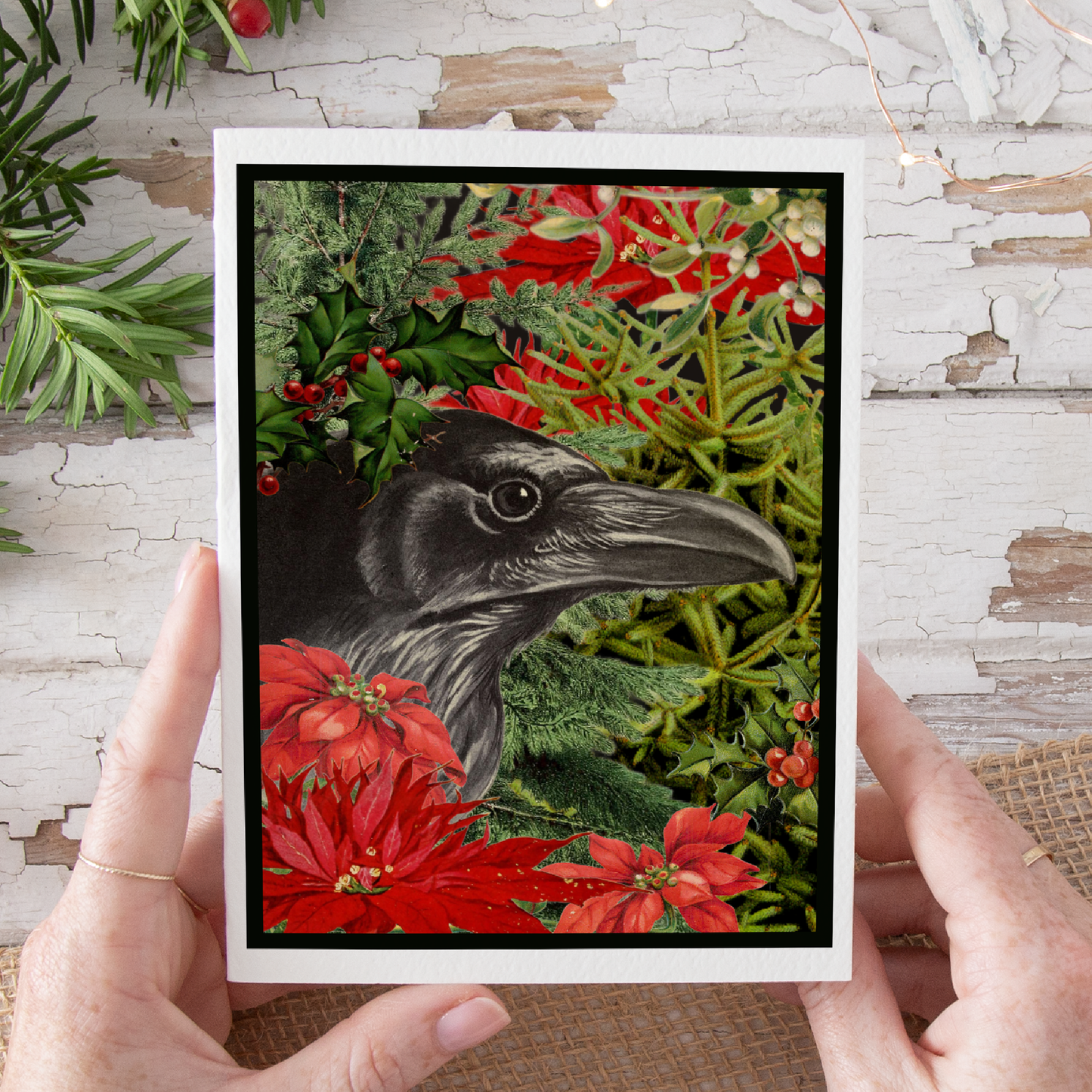 Christmas Card. Vintage Raven in Xmas Greenery.